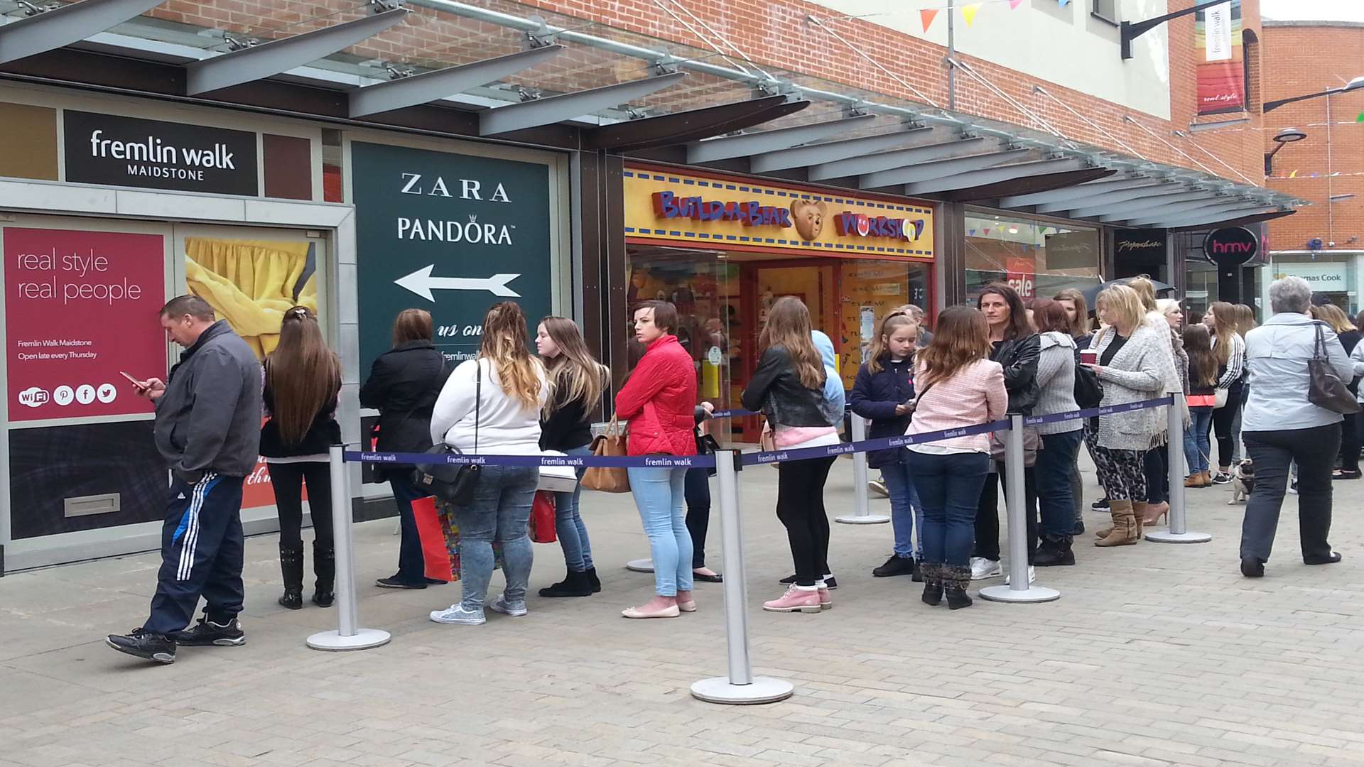 Fans queuing outside ahead of the opening