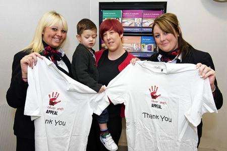 Stacey Gibson, left, and Julie O’Neill, from NatWest, Sheerness, have organised a big fundraising night at Tantra in aid of the Oliver Smith Appeal. They are pictured with Oliver and his mum Natalie