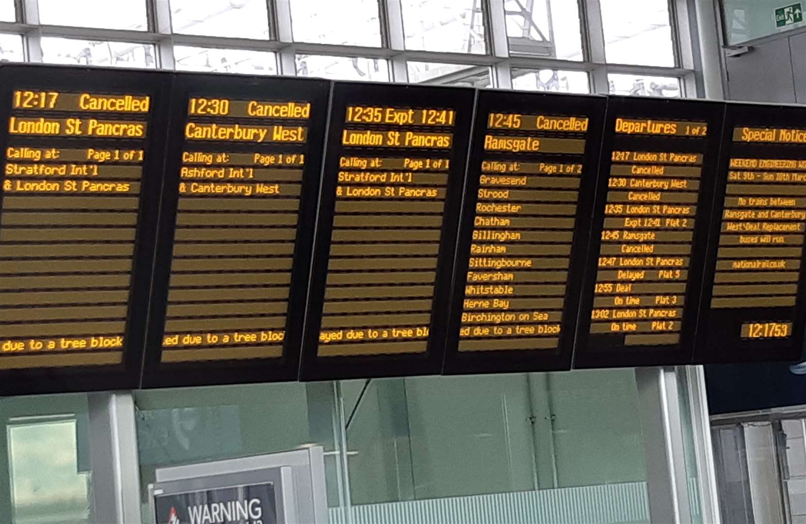 Boards showing cancelled train services in Kent