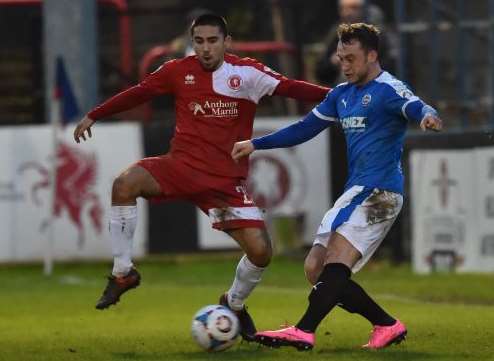 Dover's Ricky Miller takes on Welling's Barney Williams. Picture: Keith Gillard