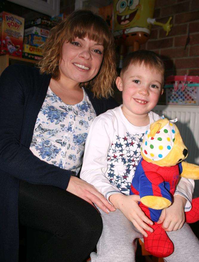 Harry Hudson, seven, and his mum Katie