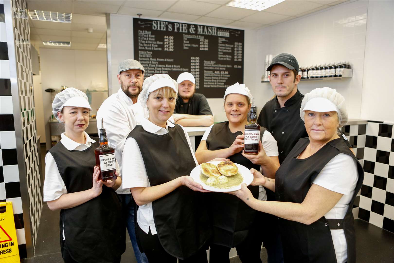 From the left Victoria Ford, Simon Maylam, Donna Maylam, Harry Maylam, Bianca Maylam, Darren Clancy, Jackie Wills and Sie's Pie and Mash shop