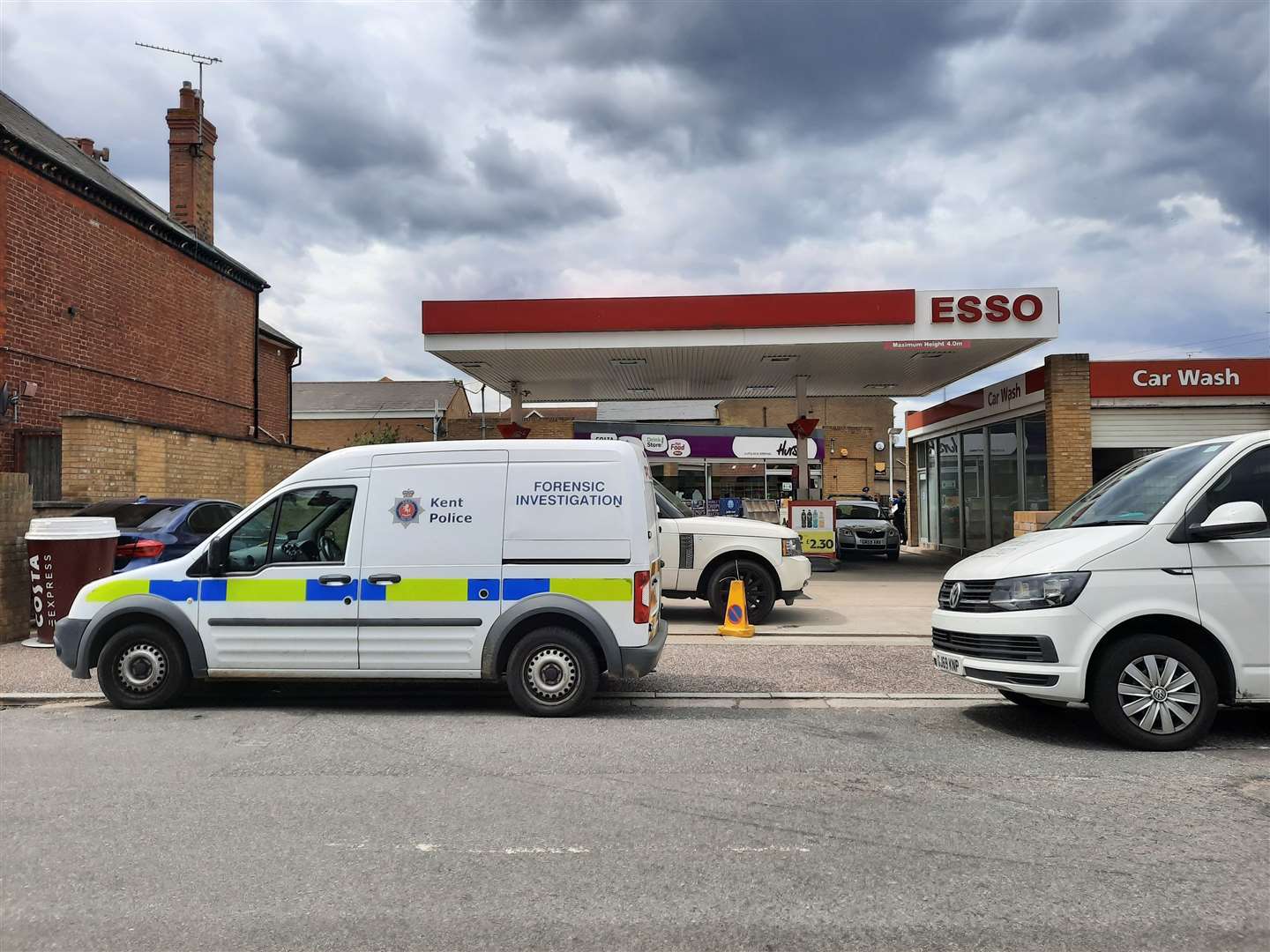 Police at the Esso station in King's Road, Herne Bay, yesterday