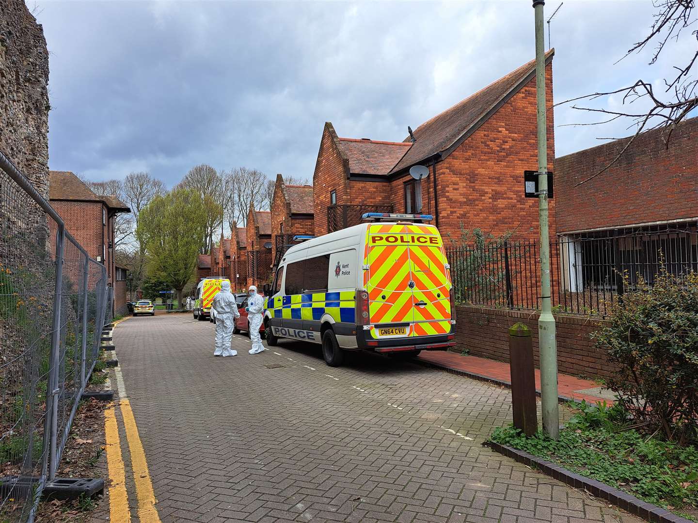 Police and forensics investigate a suspected murder after a man was found dead near Castle Street car park in Canterbury