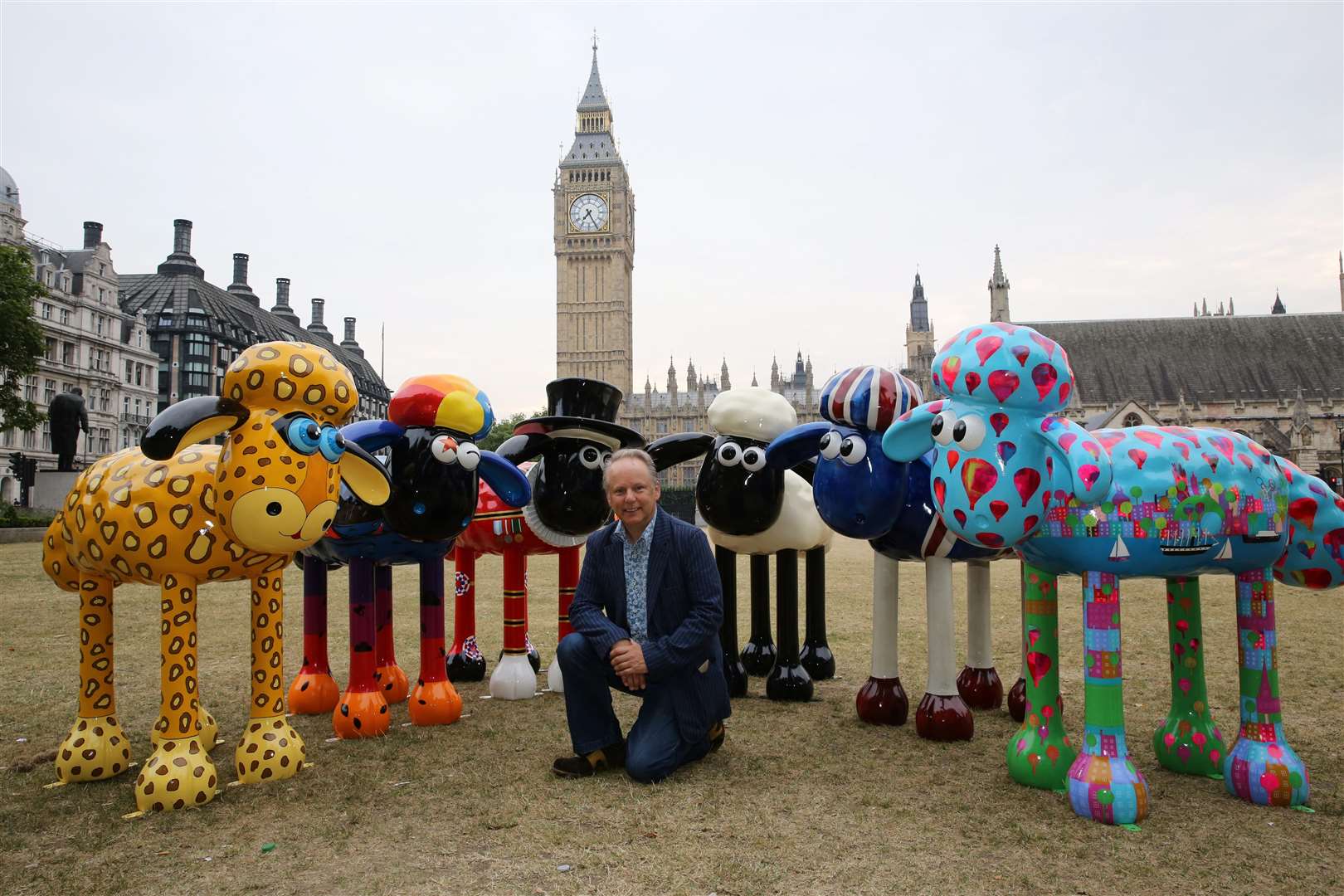 Nick Park, creator of Shaun the Sheep, with some of the Shauns