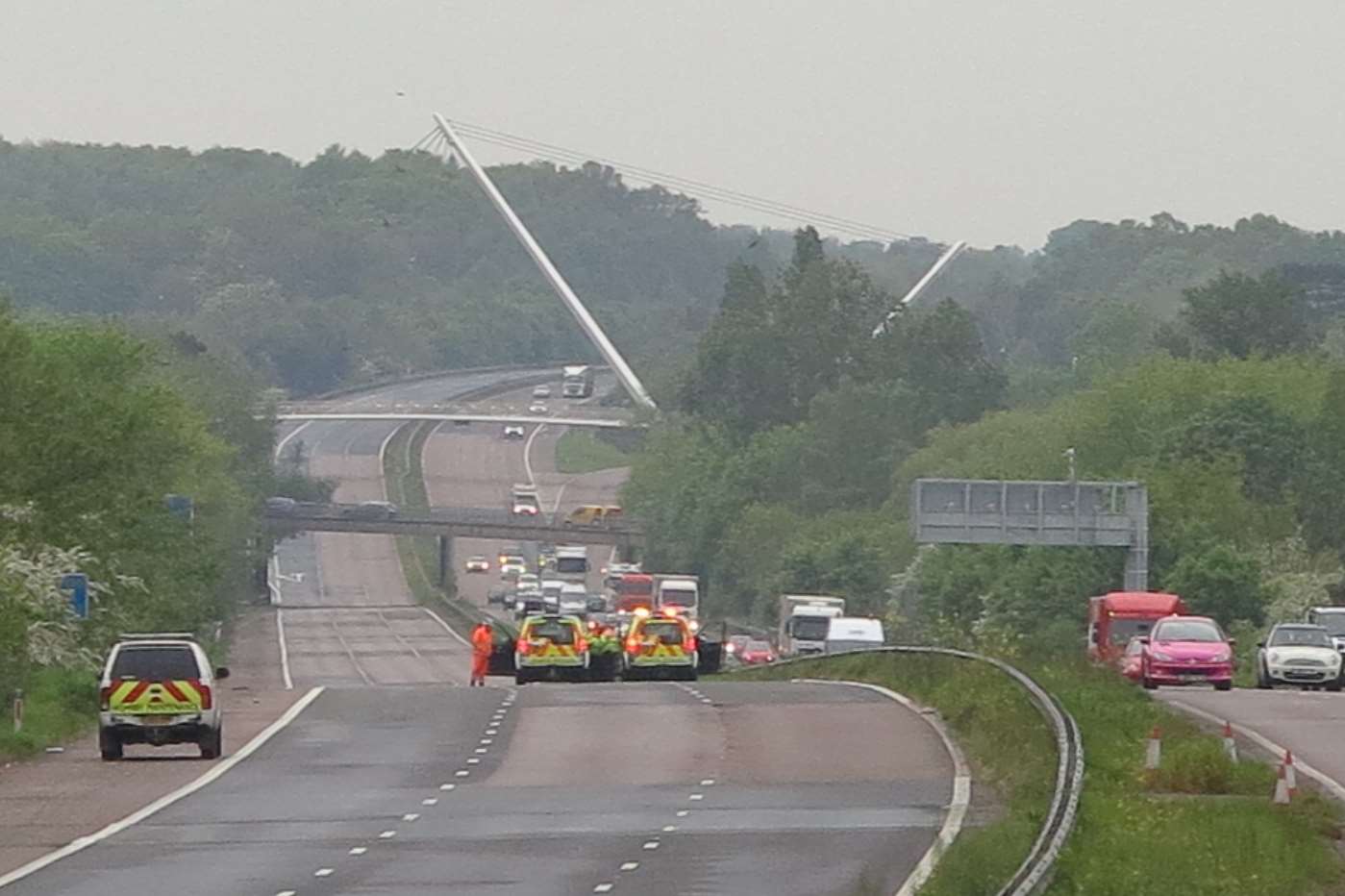Highways Agency vehicles at the scene on the M20 near Ashford. Picture: Andy Clark