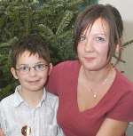 LUCKY: Lyndsay Stamp could have died if her son, Connor, had not turned off the power supply. Picture: BARRY DUFFIELD