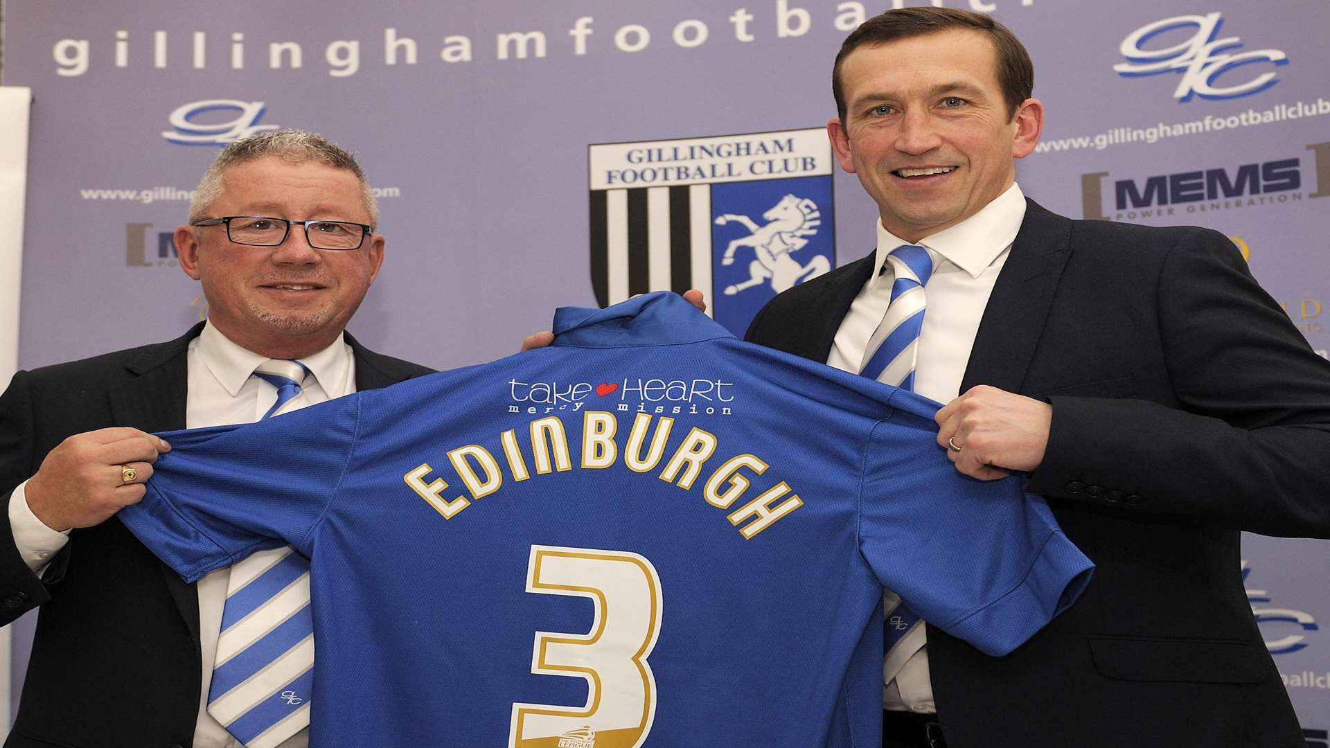 Chairman Paul Scally with new Gillingham manager Justin Edinburgh. Picture: Barry Goodwin
