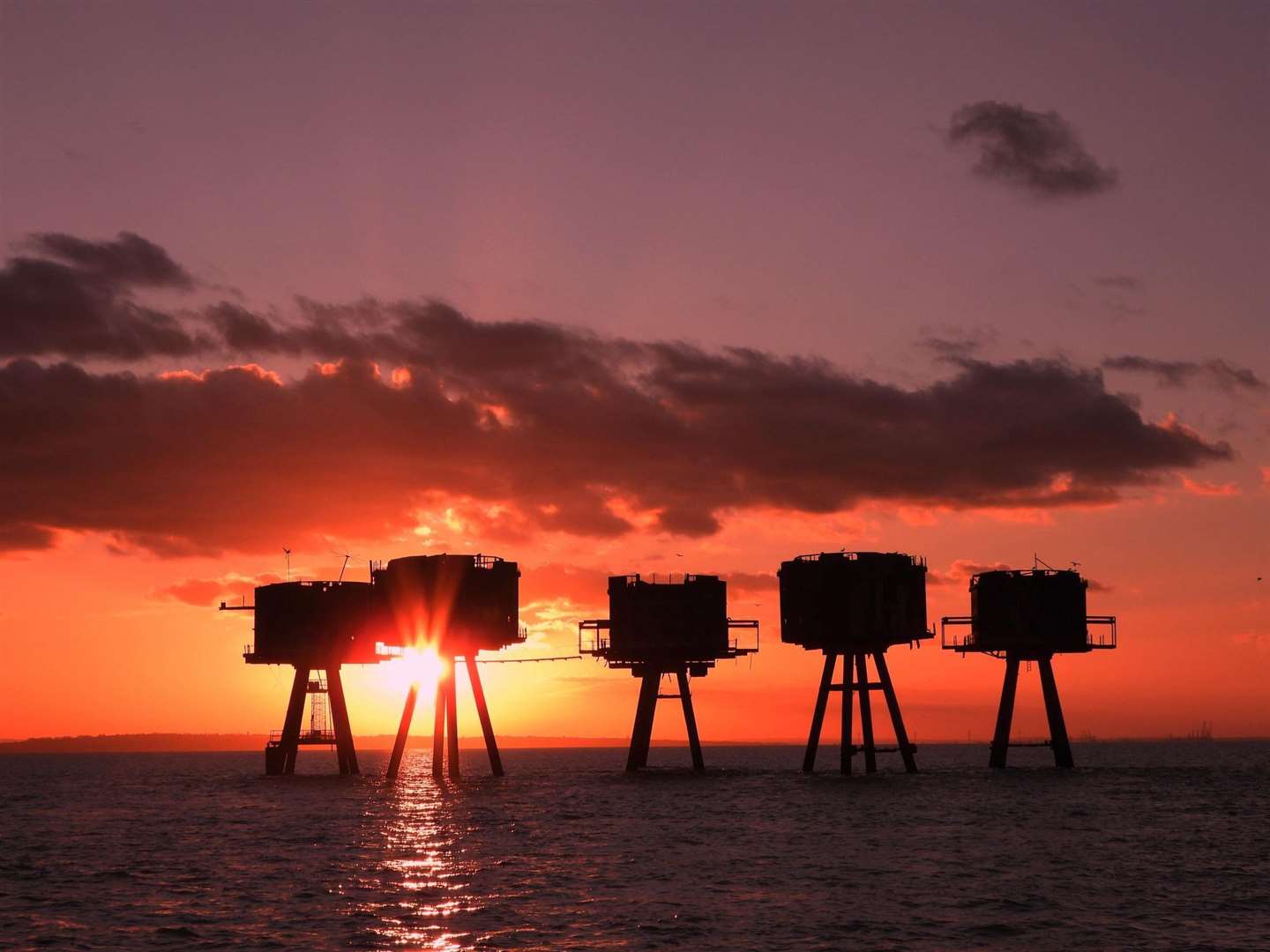 The Second World War Maunsell sea forts at sunset from the Sheppey-based X-Pilot boat. Picture: Margaret 'Flo' McEwan