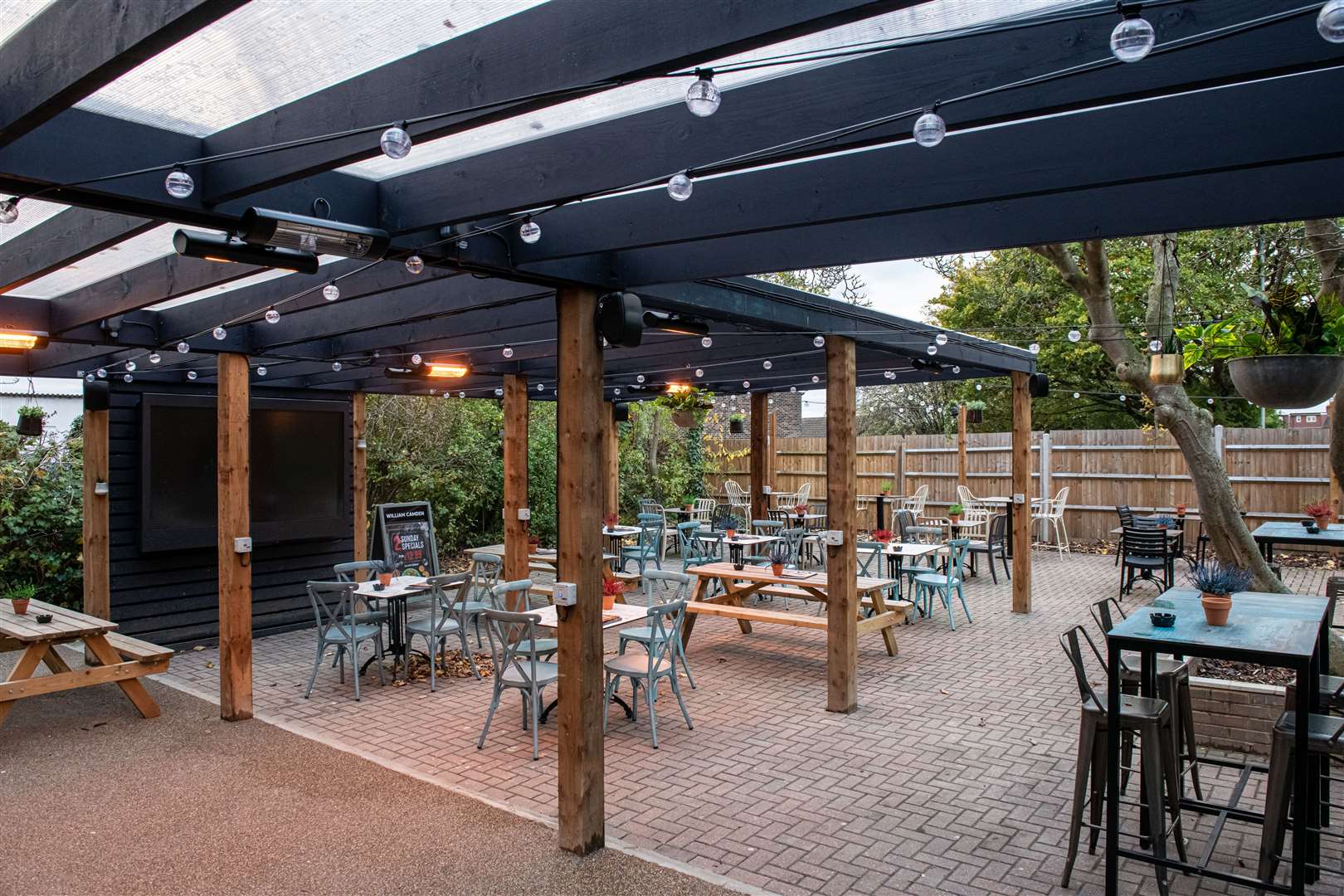 Part of the refurbishments included an extended outdoor seating area, where visitors can watch games on an 82" screen