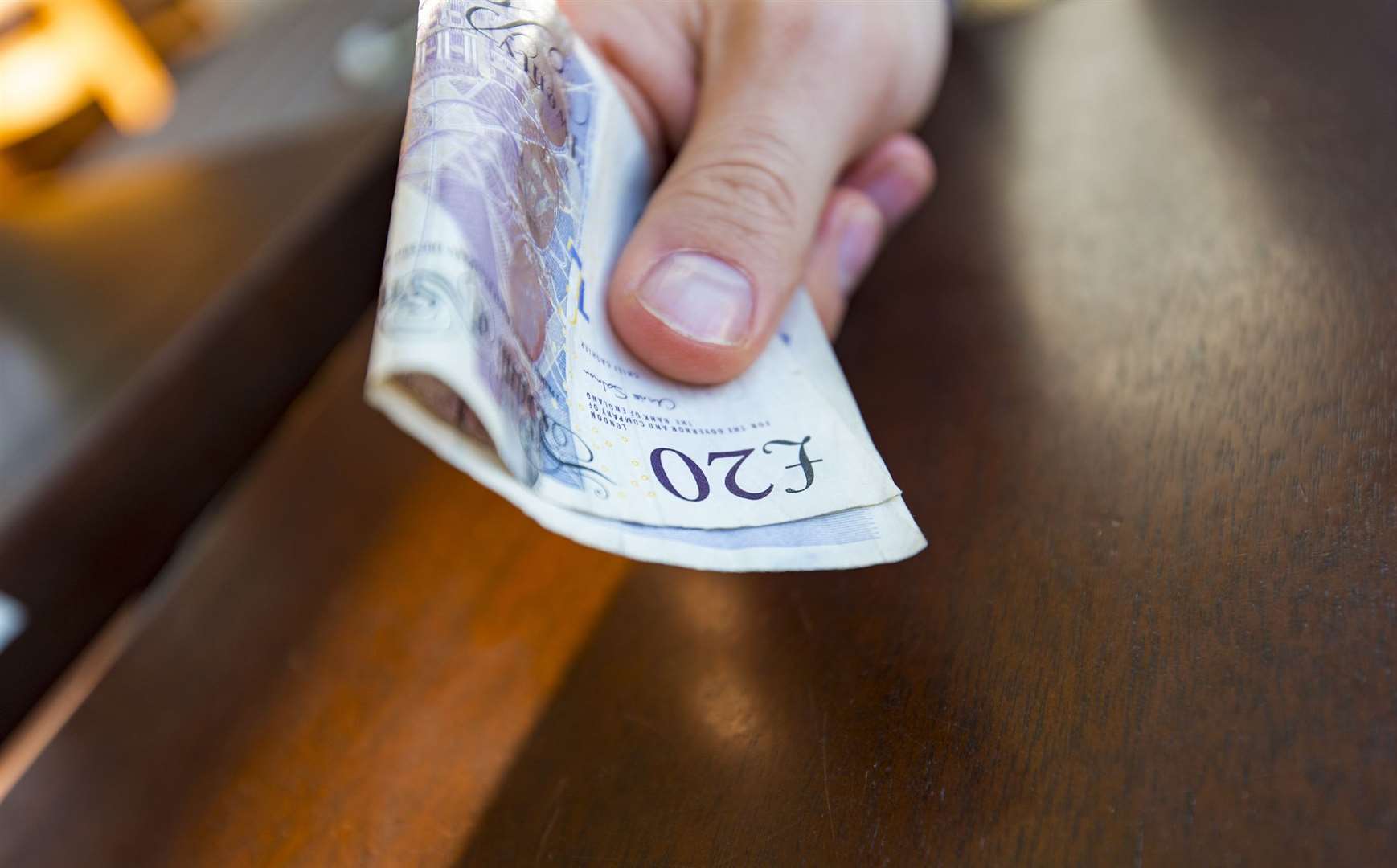 Paper notes are being withdrawn this month. Image: Getty Images.