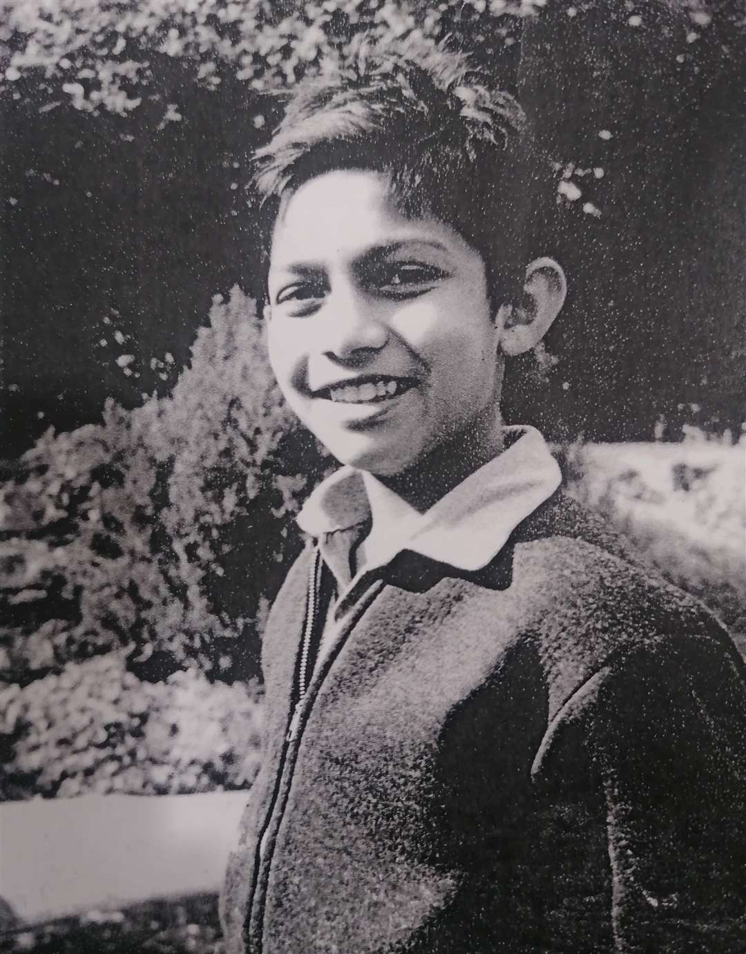 Young Dinesh, shortly after moving to the UK