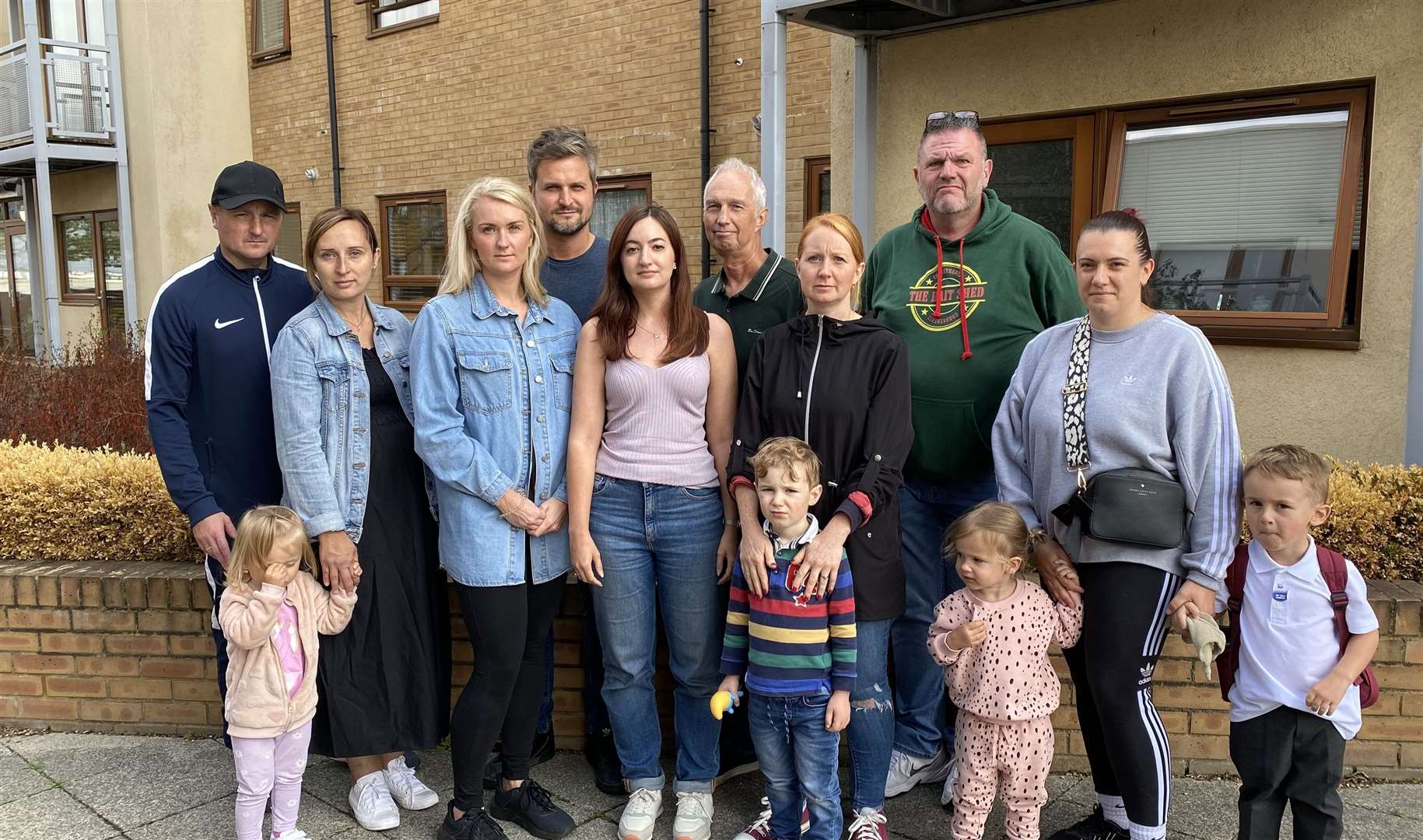 Residents living at the Thames Waterside developments in Greenhithe say they are stuck due to problems with cladding forms. From left to right: Adam Dybala, Natalia Dybala , Chloe Dunkley, Dan Dunkley, Emily Abbott, Roy Davis, Rachel Davis, Neil Corder, Jenny O’Brien.