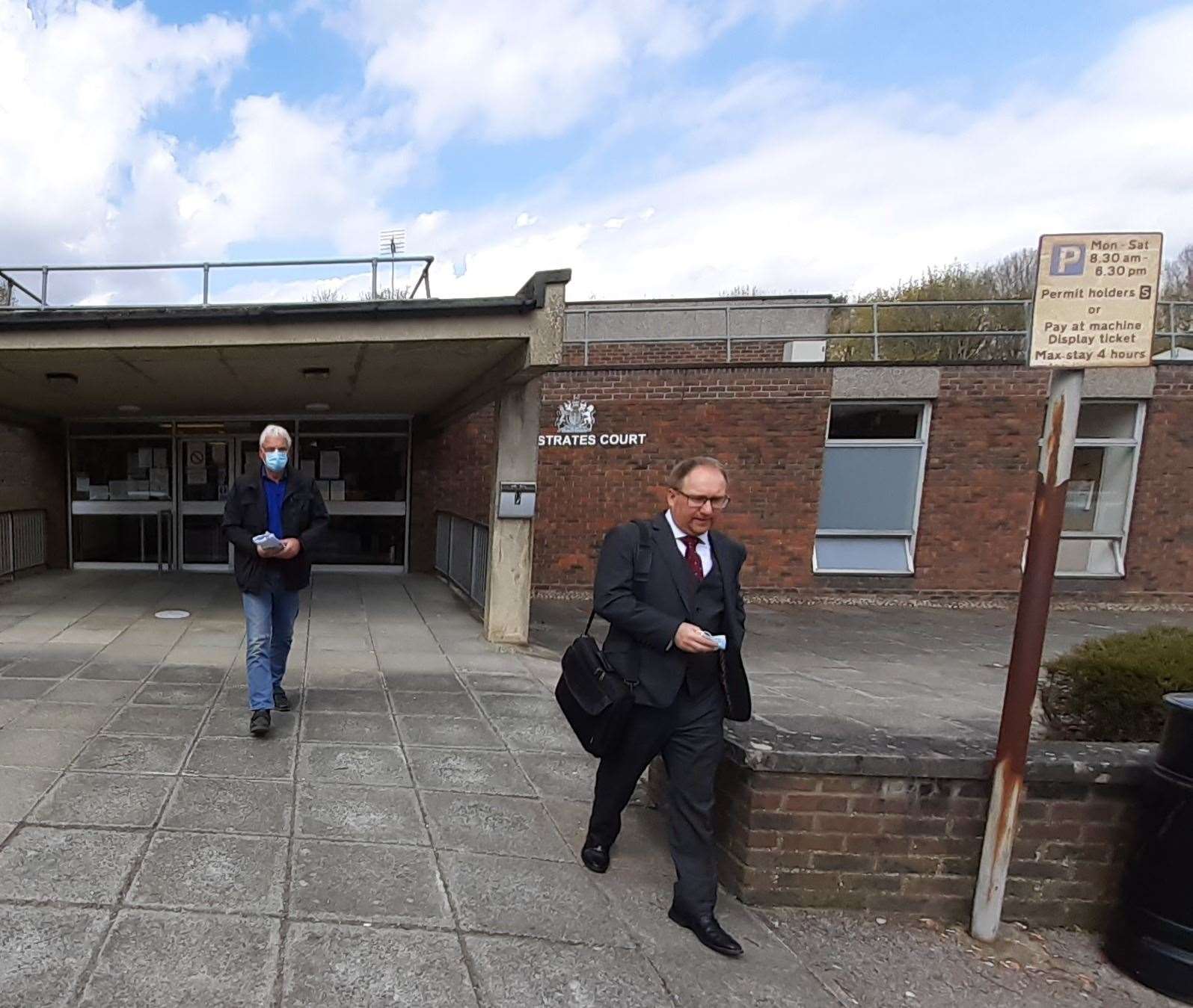 The Tunbridge Wells council solicitor Robin Harris (right) leaving Sevenoaks Magistrates Court ahead of Christopher Wright