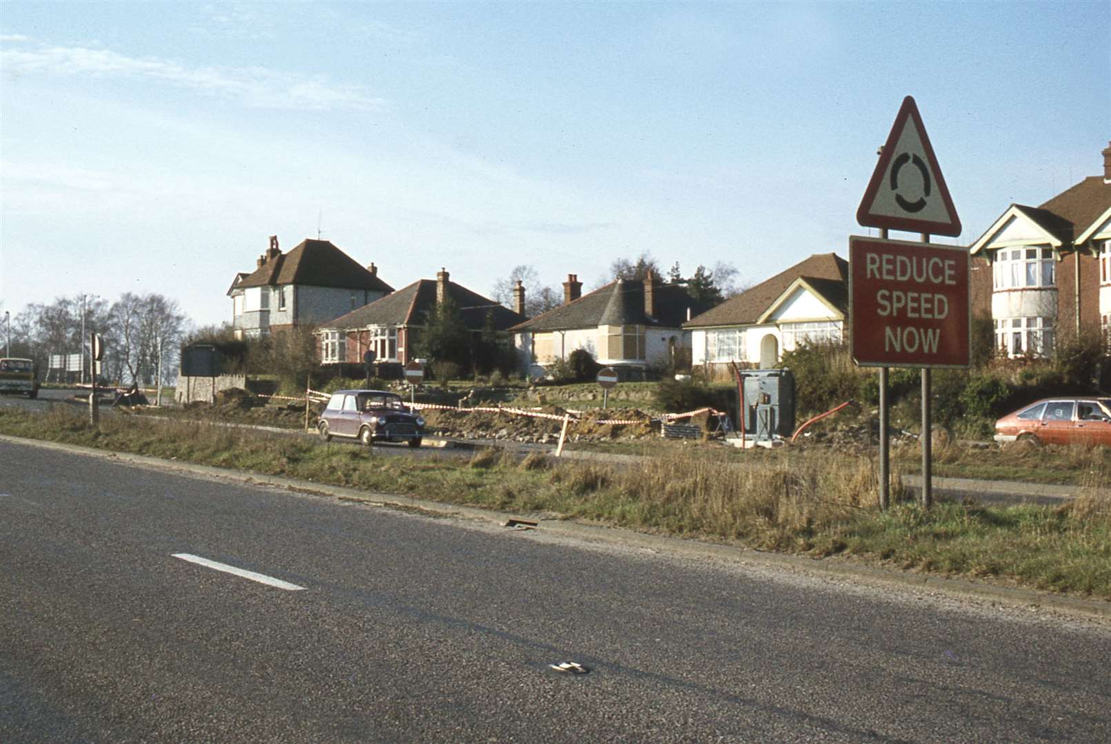 Some of the blighted houses in The Street Willesborough in 1978, beside the Ashford Bypass which was converted to the M20. Picture: Neville Marsh