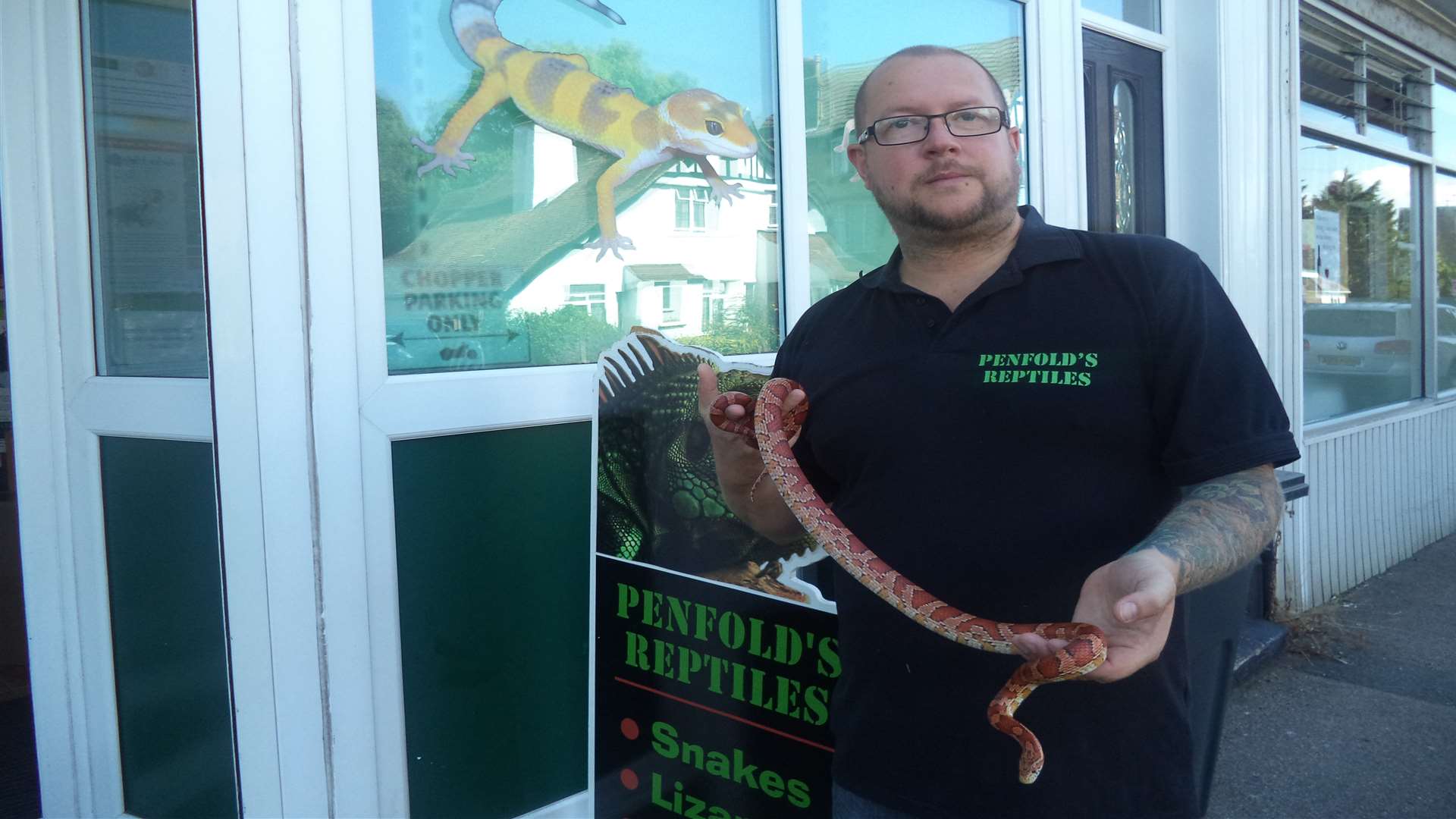 Shop owner Terry Matthews is hoping to find the snake's owner