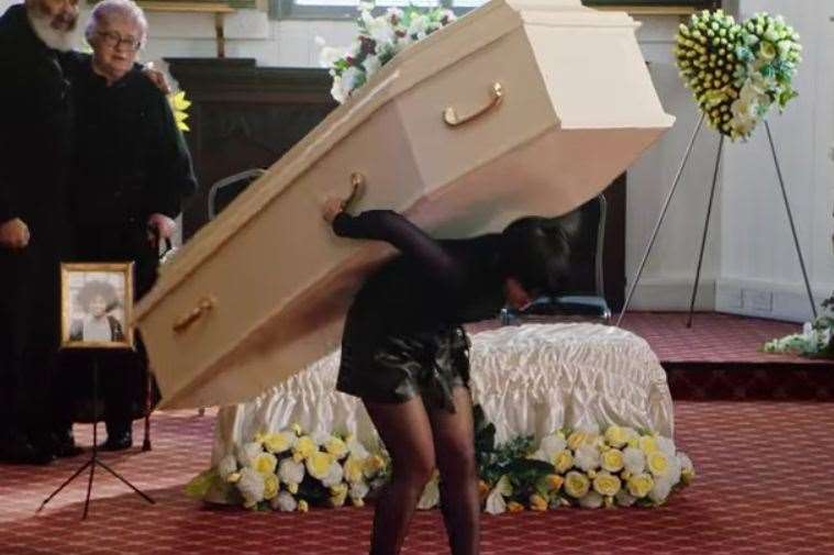 A woman steals a coffin in the Lynx advert shot in the Tin Tabernacle, Hythe. Picture: Lynx