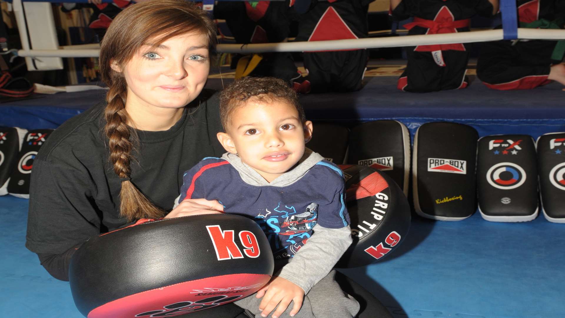 Joseph Miall, 3, with coach Martina Jones, at TKO Elite Gym