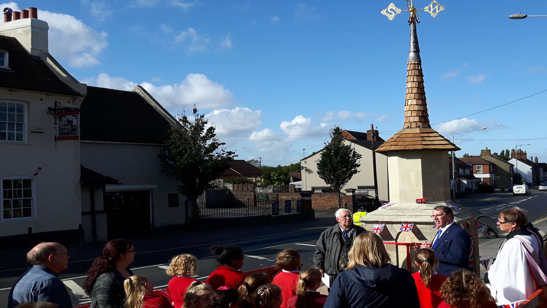 Teynham's village pump is re-dedicated in a ceremony involving a cross-section of people from the village