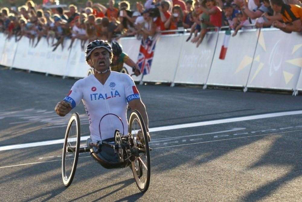 Alex Zanardi crosses the line to secure the gold medal at Brands Hatch during the London 2012 Paralympics