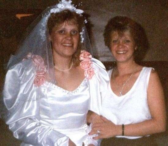 Debbie Griggs on her wedding day, pictured with her sister Wendie Rowlinson