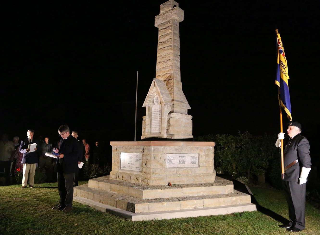 The ceremony at the war memorial on Monday night. Picture by Antony Rowse