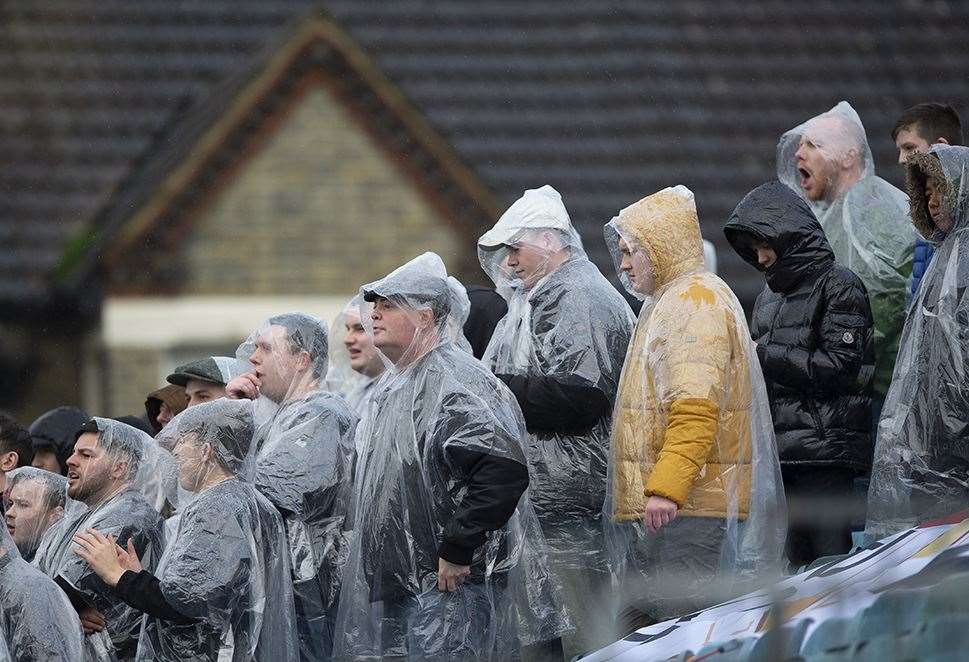 MK Dons fans in the rain at Priestfield Picture: Ady Kerry (24847940)