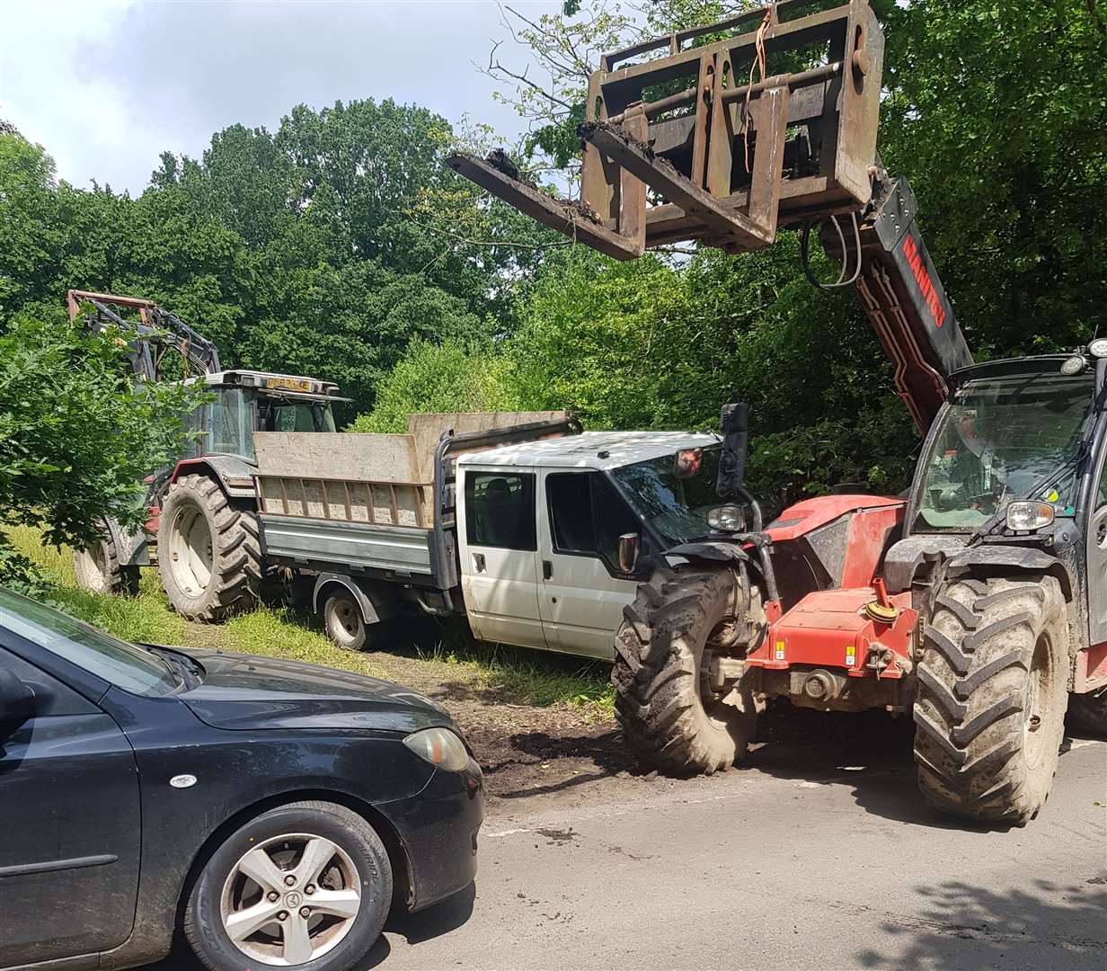 The fly-tippers' van blocked in at Harvel House Farm by the farmers fed up with regularly having to deal with rubbish being dumped on their land. Picture: Trevor Jones