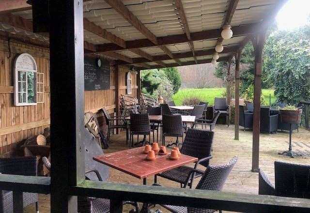 There is a large covered seating area directly at the back of pub and, judging by the number of stacked chairs and tables, they’re used to the garden being busy in better weather