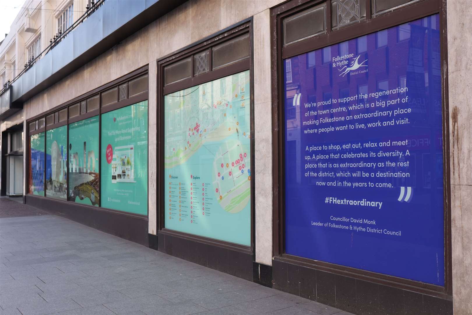 After the store closed in January, a vinyl wrap was installed in the windows to promote Folkestone
