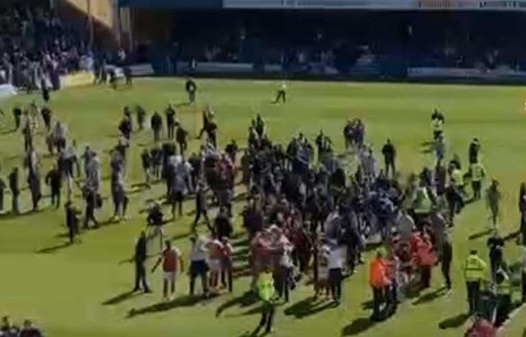 Pitch invaders at Priestfield Stadium in Gillingham, Medway, on April 30