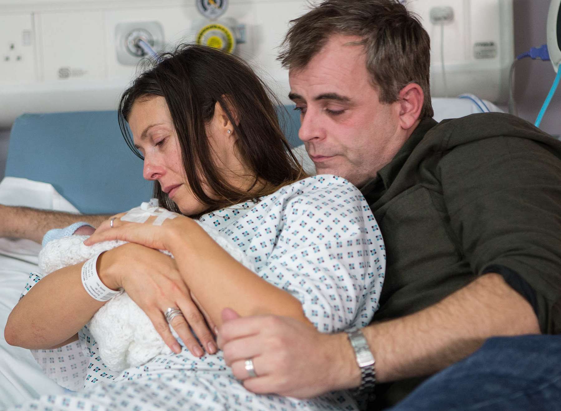 Michelle Connor and husband Steve cradle their baby in Coronation Street. Picture ITV
