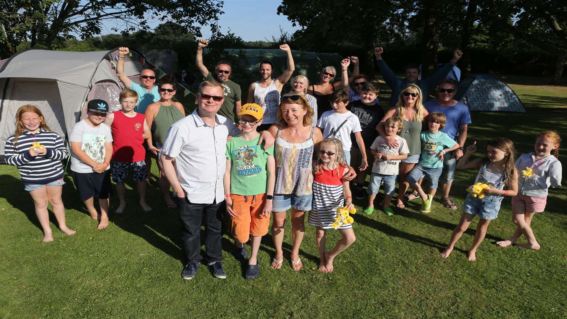 Dad Keith Abrehart, his son George, his wife Carol and their daughter, Beth, with friends and family at Campfest
