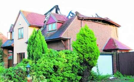 The fire destroyed the top floor and roof of the house