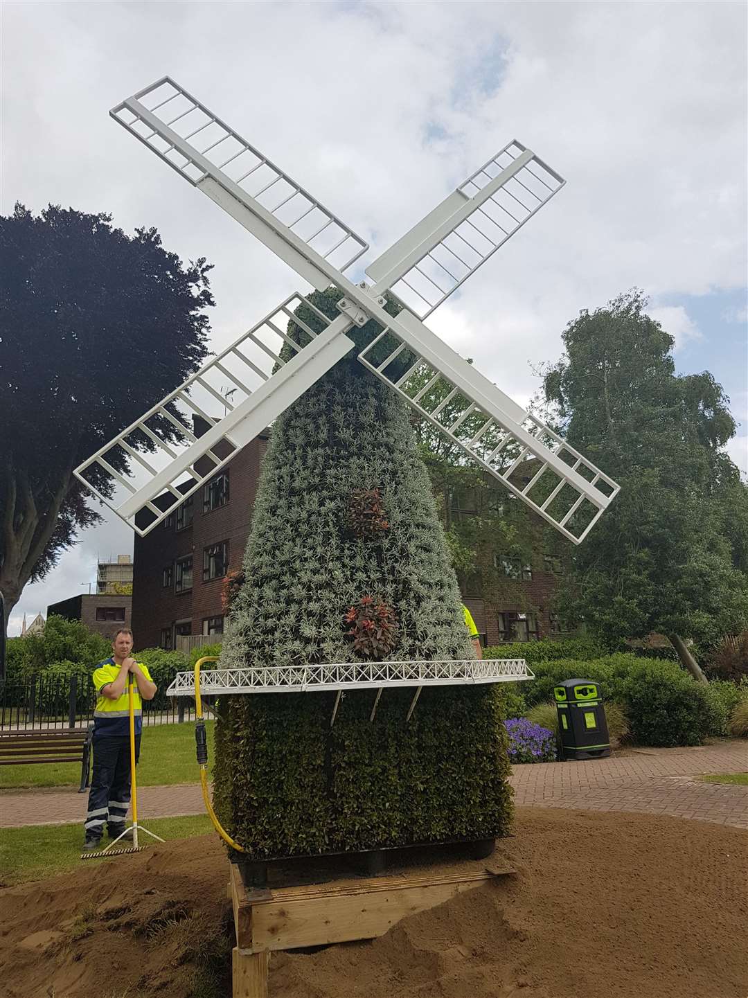 Council employees have been installing the mill sculpture today on a specially-built mound in Ashford's Memorial Gardens