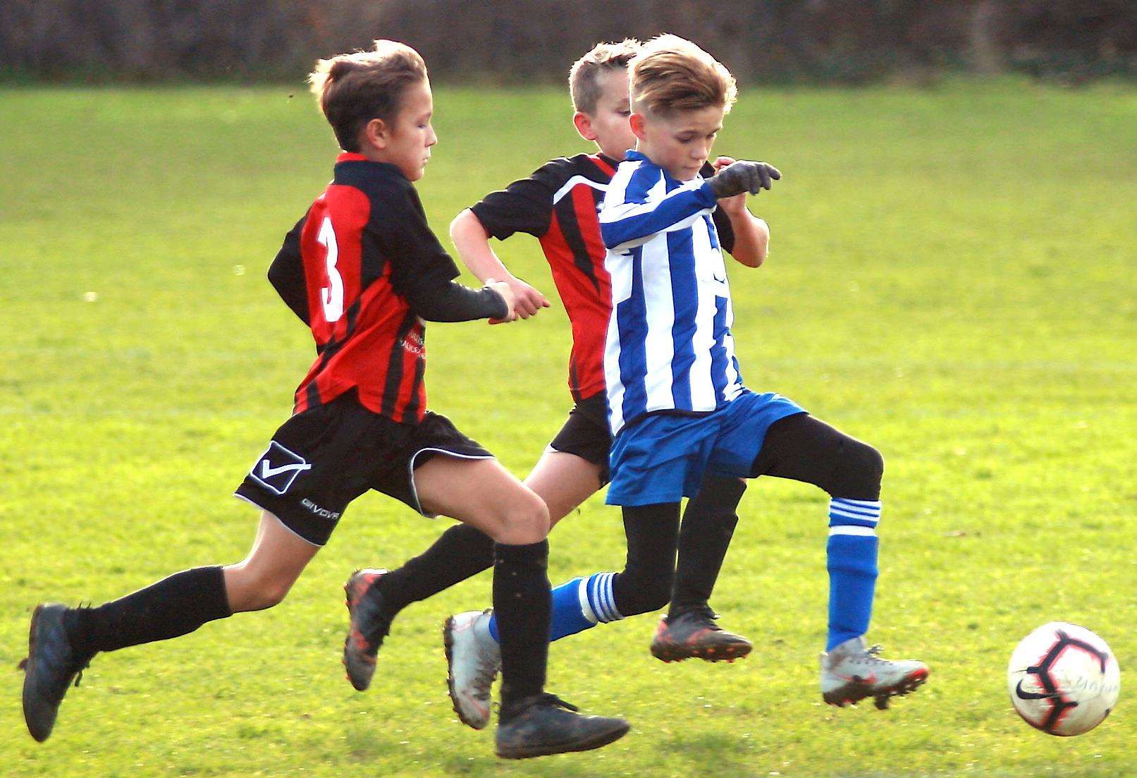 Woodcoombe Youth and Chatham Riverside clash in Under-12 Division 3 Picture: Phil Lee