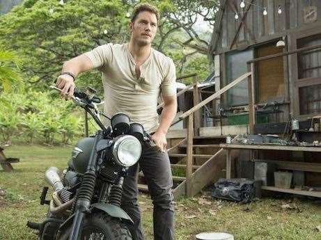 Screengrab of Chris Pratt in Jurassic World riding a triumph motorbike. Picture: Universal Pictures