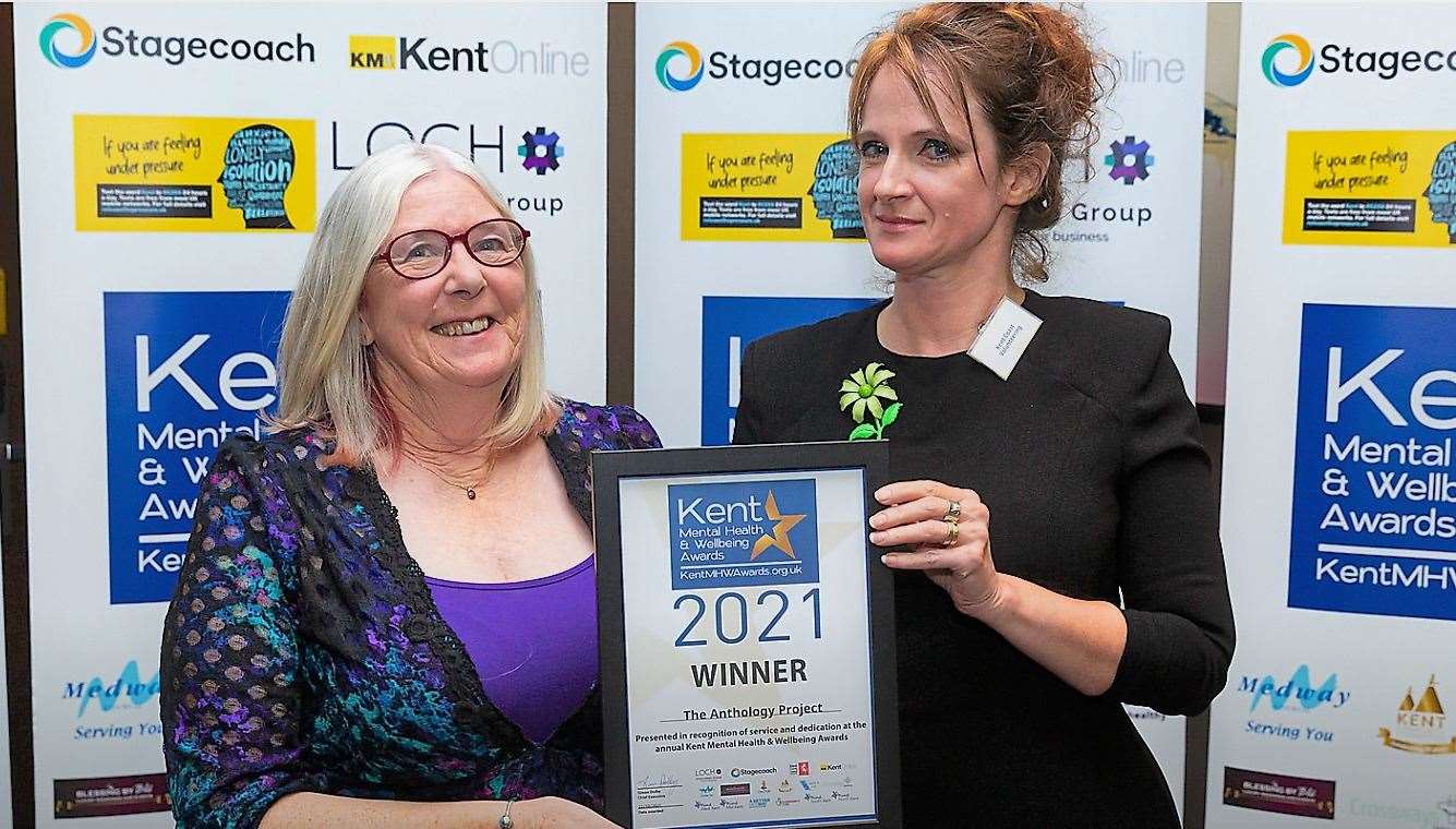 Katy Murray, right, receives an award for the Kent Coast Volunteering Anthology project.  Image: South Kent Mind