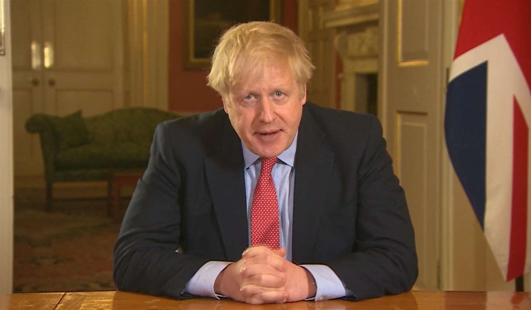 Boris Johnson addresses the nation from Downing Street, as he placed the UK on lockdown (PA)