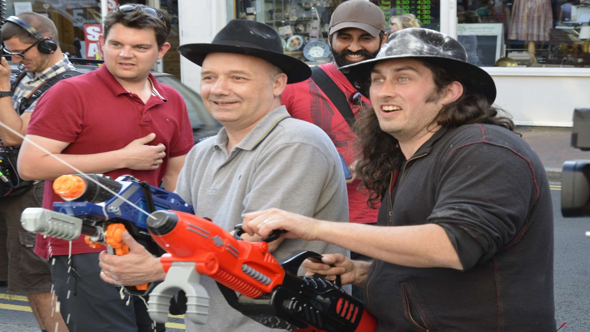Bob Mortimer and fellow comedian Ross Noble armed with custard-loaded water pistols at the Black Dog Cafe in Tunbridge Wells in 2013. Picture: Martin Apps