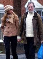 Canon Richard Marsh with girlfriend Rosemary Hallam walking in Rye, East Sussex. Picture: MIKE GUNNILL