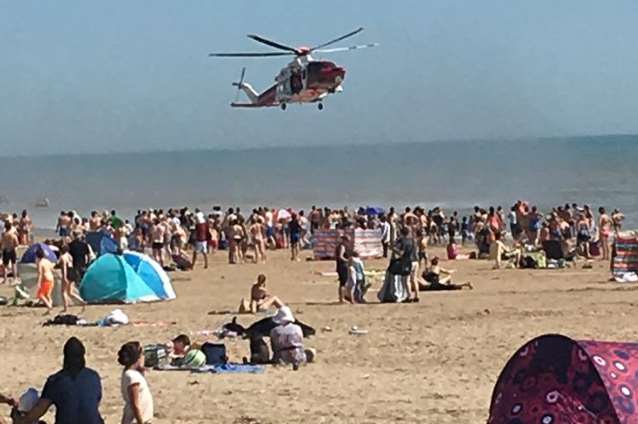 Air ambulance and coastguard's search and rescue helicopter were called