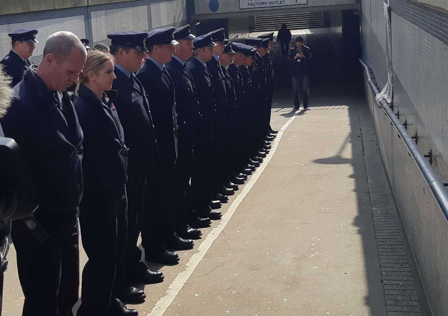 Firefighters stand in line in front of the plaque on its unveiling day in 2019. Picture: Sam Lennon KMG