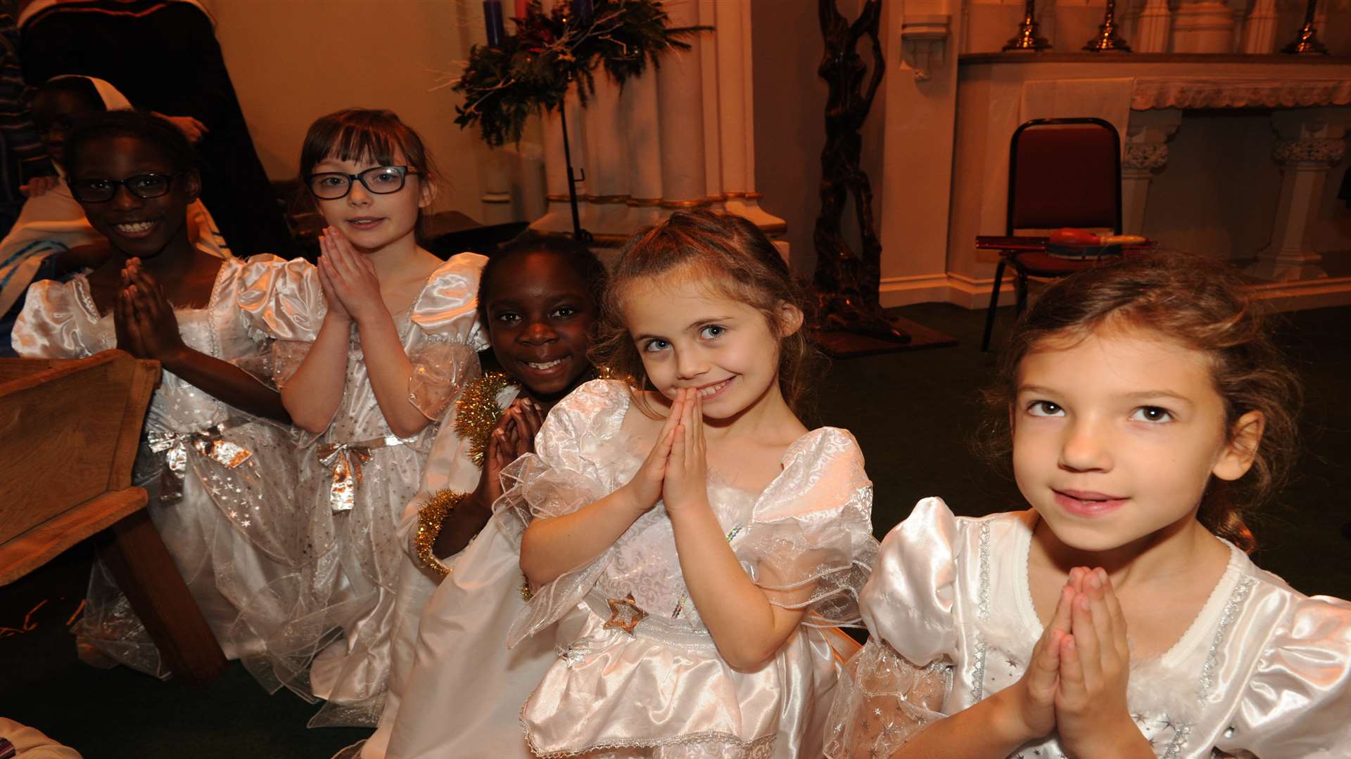St Joseph's Preparetory School carol service. L-R: Moyo, Eleanor, Azaria, Andrea and Savannah