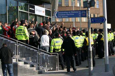 Swindon fans outside Gillingham railway station