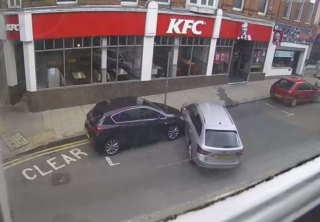 A driver crashed into two cars while trying to park in a town high street. Picture: Lisa Berry