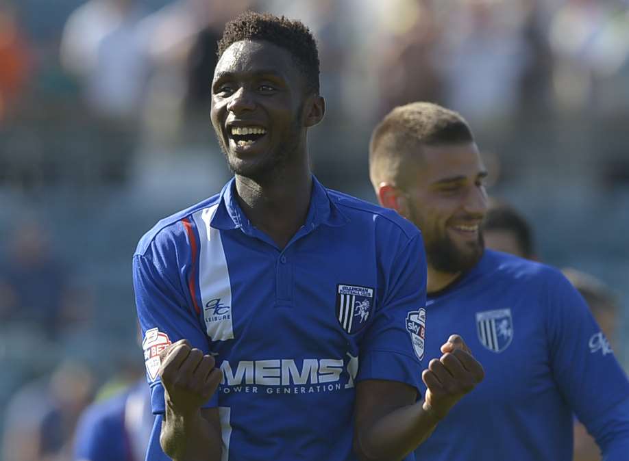 Emmanuel Osadebe celebrates Gillingham's win against Sheffield United on his Football League debut Picture: Barry Goodwin