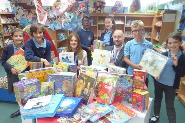 Chartham Primary pupils and staff, including assistant head Iain Rudgyard, with their prize books (4767168)
