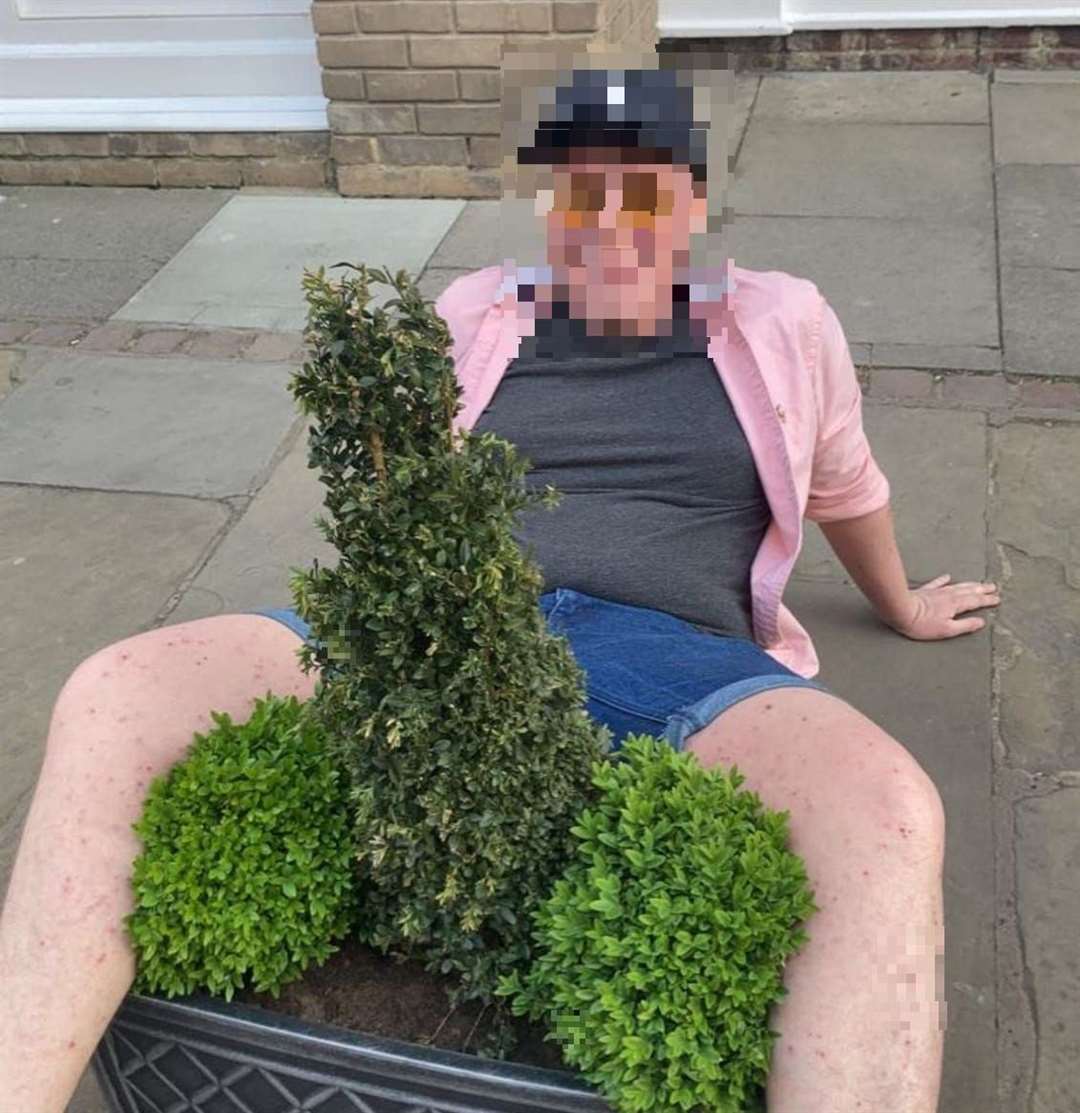Some pranksters enjoyed posing with the shrubs. Picture: Matthew Evans