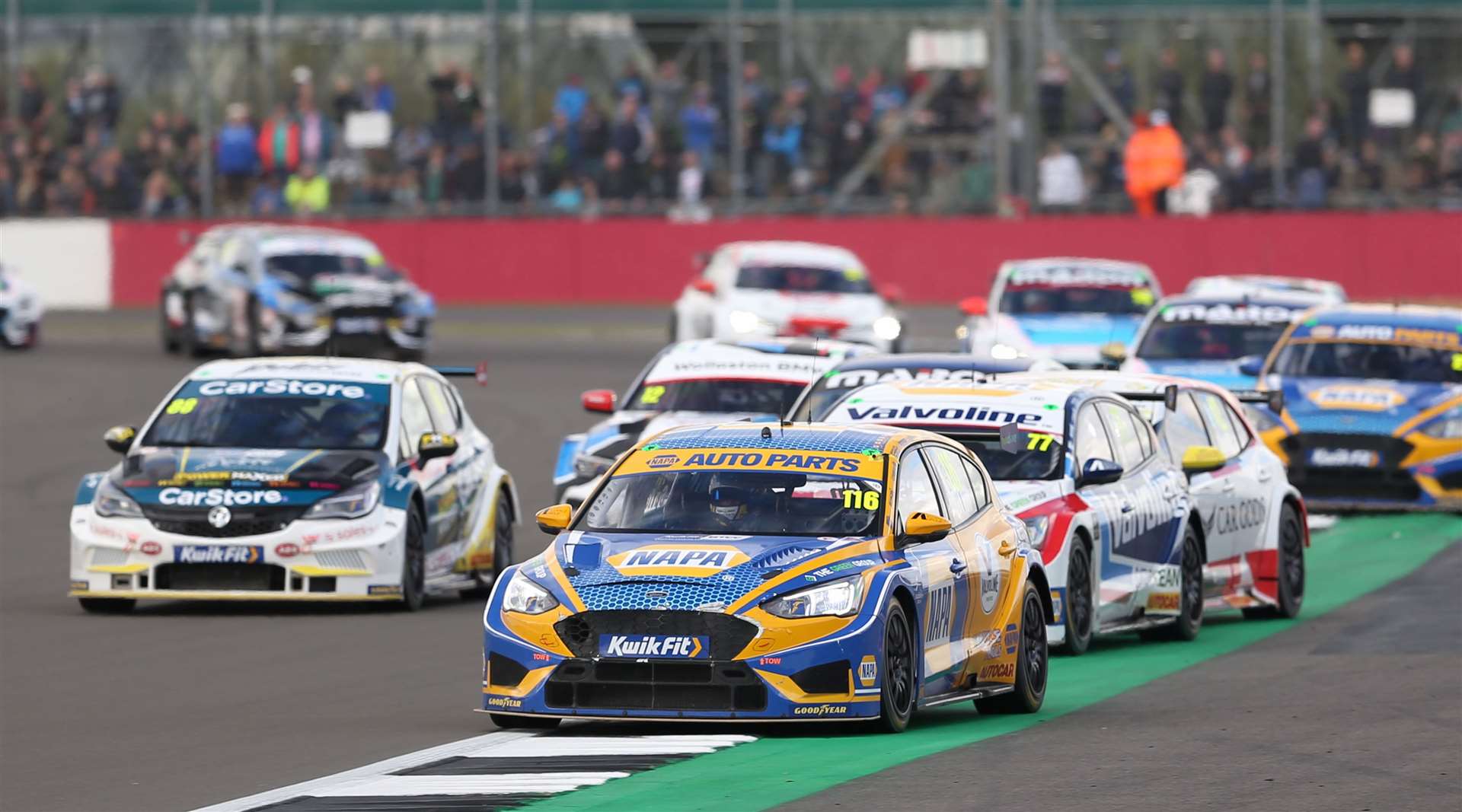 Ash Sutton battles to keep the opposition behind at Silverstone. Picture: BTCC